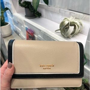 Kate Spade purse with long strap perfect for daily use and going out